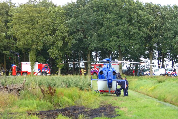 Auto te water en inzittende spoorloos