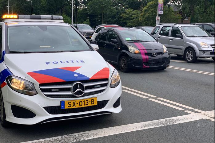 Kop-staart botsing voor stoplicht