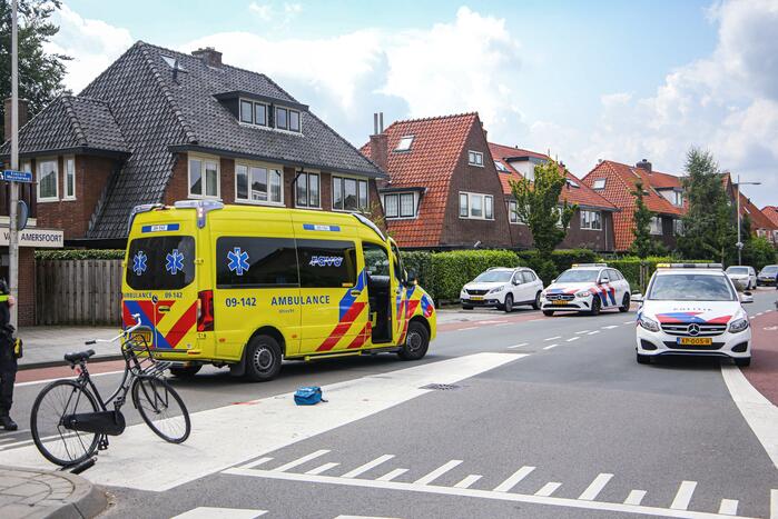 Fietsster geschept door auto