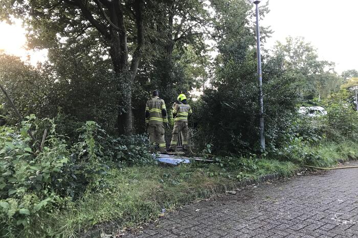 Afval in brand gestoken in bosjes