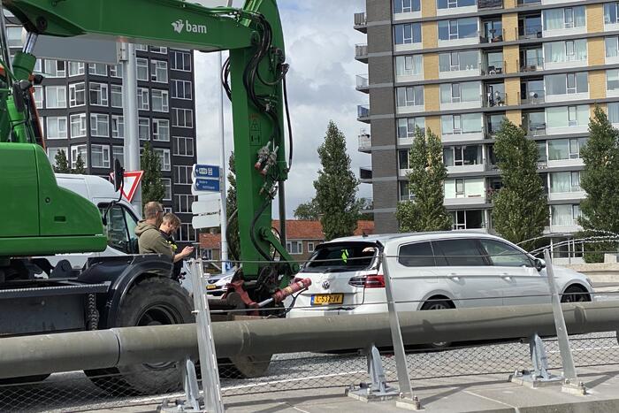 Veel schade door kop-staart botsing met graafmachine