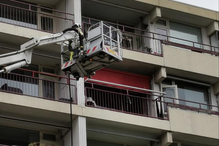 Etage appartementencomplex ontruimd bij brand