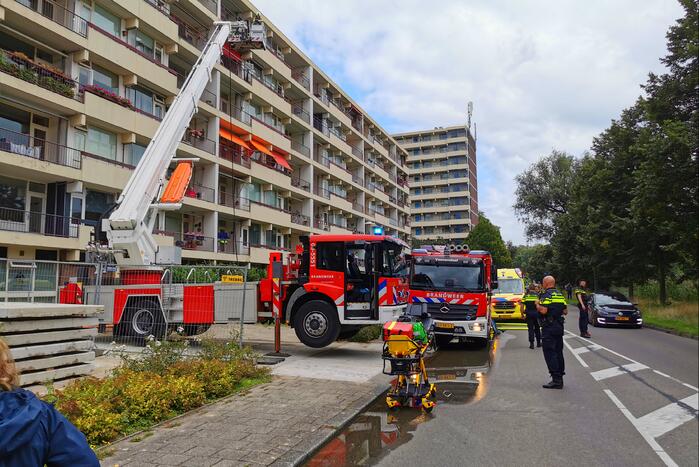 Etage appartementencomplex ontruimd bij brand