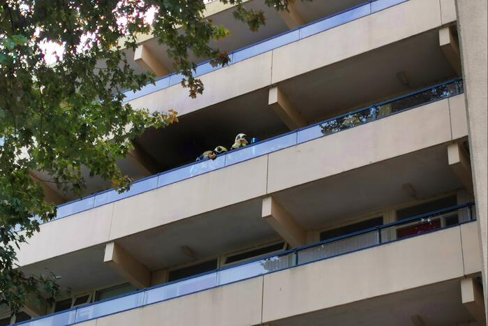 Etage appartementencomplex ontruimd bij brand