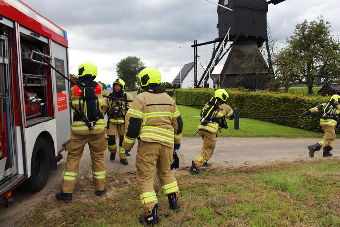 Hooi balenpers vliegt in brand