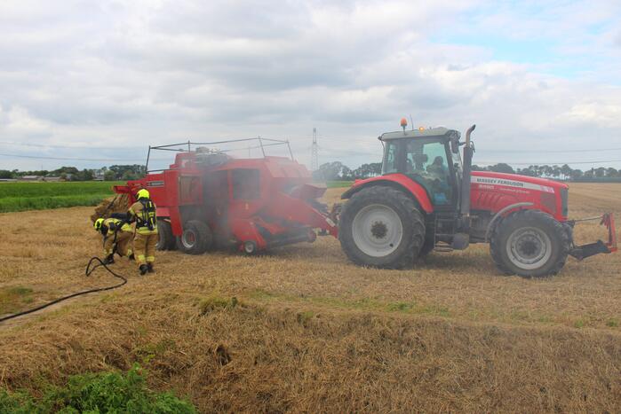 Hooi balenpers vliegt in brand