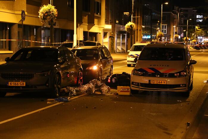 Scooterrijder en passagier gewond door ongeval met politieauto