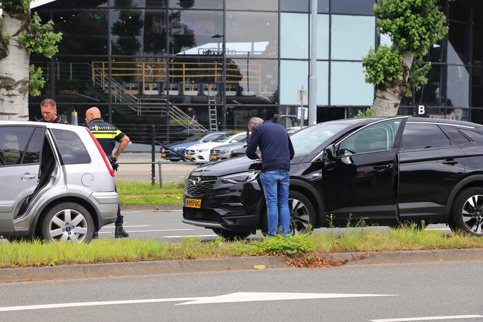 Kop-staart botsing voor stoplicht