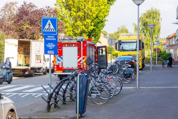 Dakdekkers zetten pand informatiewinkel Indebuurt033 vol rook