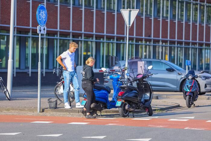Fietsster gewond bij botsing met scooter