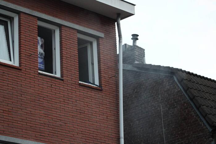 Woning vol rook door brand