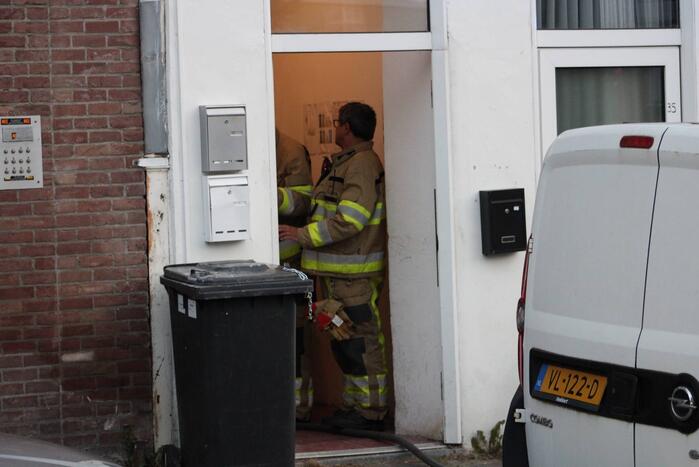 Woning vol rook door brand