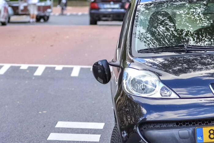 Man op scooter gewond bij aanrijding