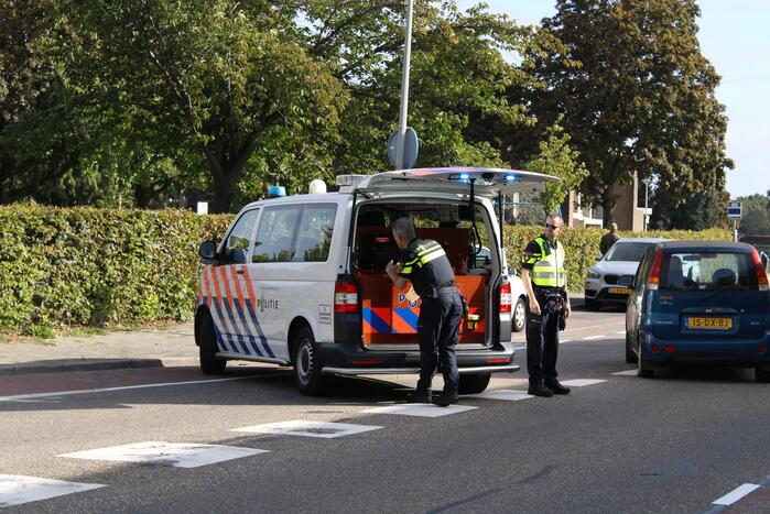 Racefietser gewond bij botsing met auto