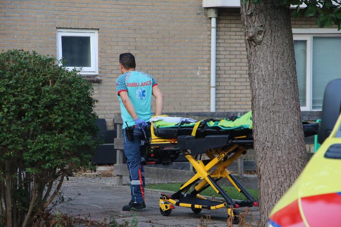 Persoon gewond na val van hoogte