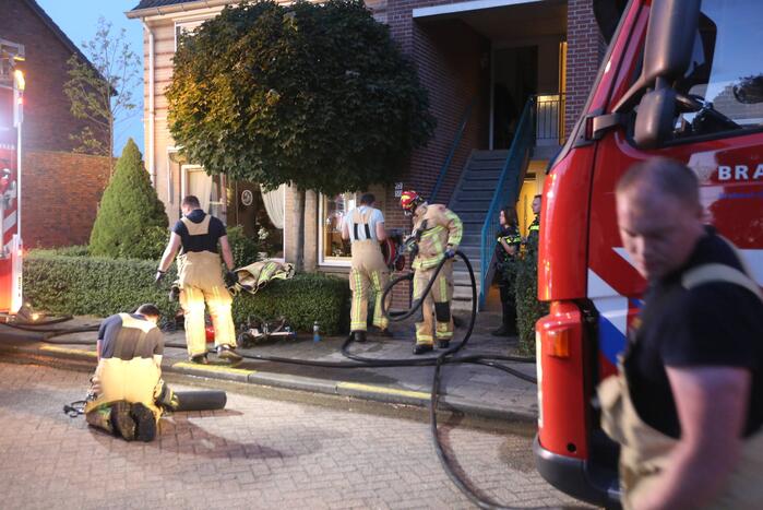 Veel rook bij brand in portiekwoning