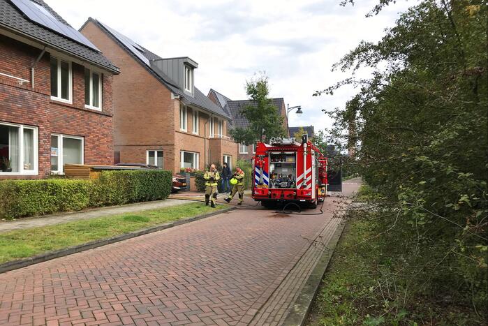 Brand in schuur naast woning