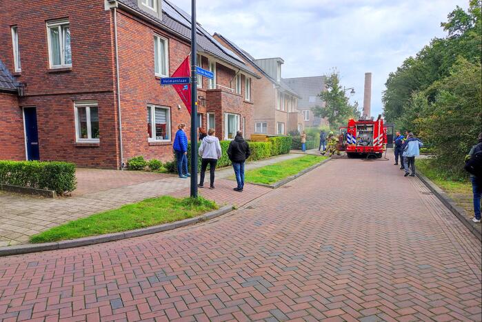 Brand in schuur naast woning