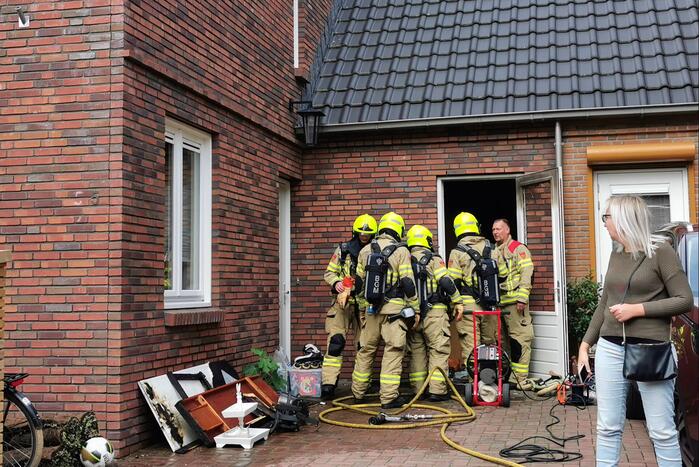 Brand in schuur naast woning