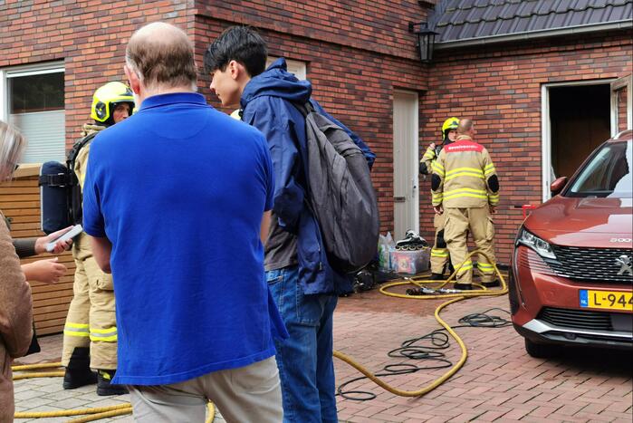 Brand in schuur naast woning