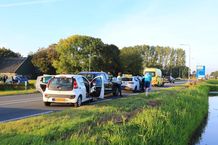 Kop-staartbotsing met lesauto
