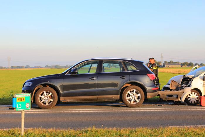 Kop-staartbotsing met lesauto