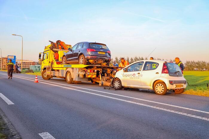 Kop-staartbotsing met lesauto