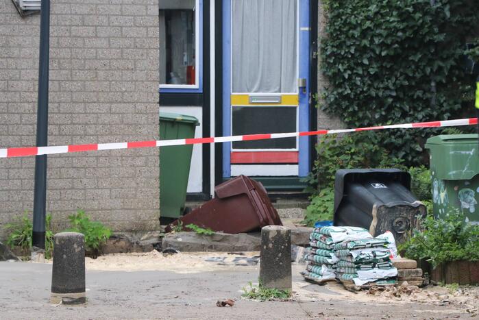 Voorzijde weggezakt bij een woning