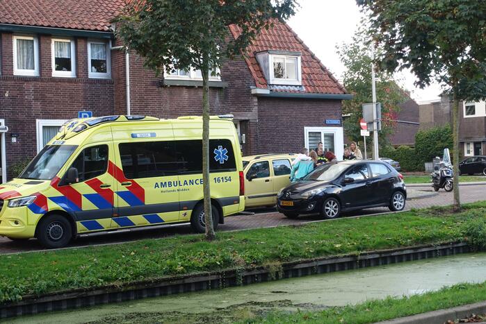 Scooterrijder struikelt over over hondenriem