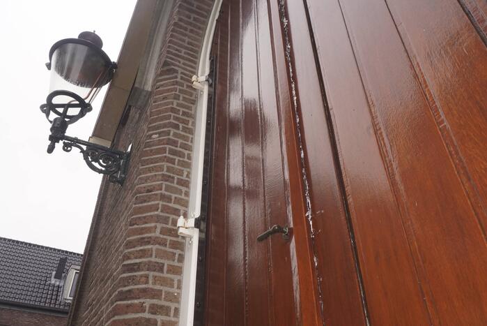 Deur gereformeerde kerk Noorderkerk dichtgekit