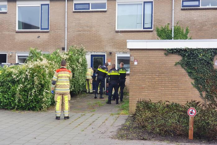 Voordeur woning geforceerd bij waterlekkage