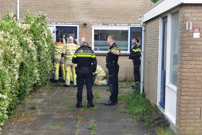 Voordeur woning geforceerd bij waterlekkage