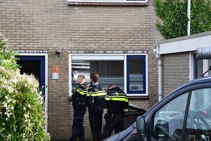 Voordeur woning geforceerd bij waterlekkage