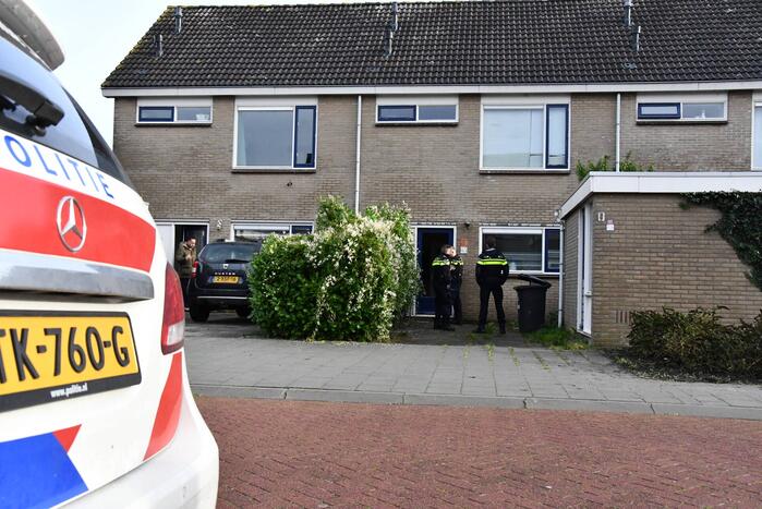 Voordeur woning geforceerd bij waterlekkage