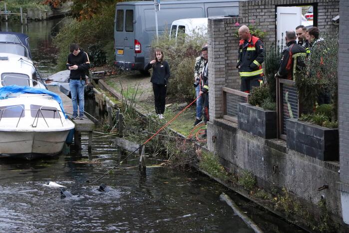 Duikers zoeken naar geld en drugs