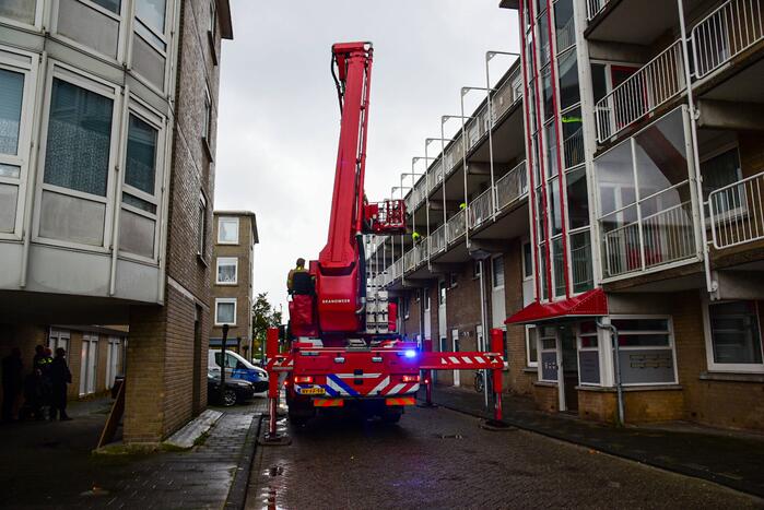 Brandweer blust brand in wasdroger