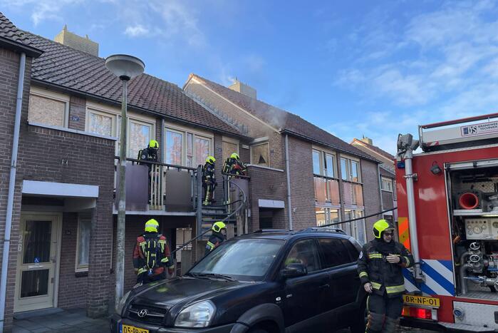 Deur open gezaagd bij brand
