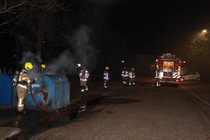 Brandstichting in container met papier