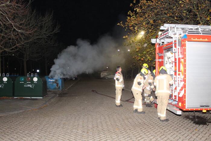 Brandstichting in container met papier