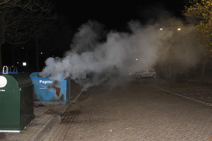 Brandstichting in container met papier
