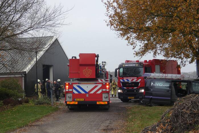 Brand in grasmaaier slaat door naar dak