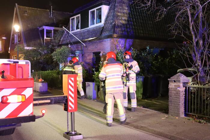 Brand in schoorsteen van woning