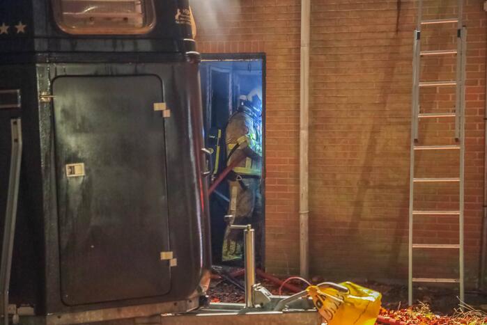 Uitslaande brand in winkelpand