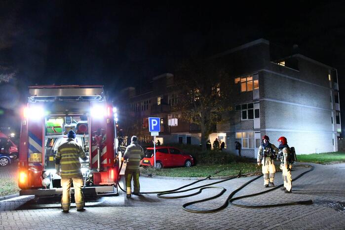 Brand in portiekwoning snel geblust
