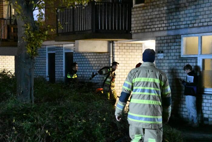 Brand in portiekwoning snel geblust