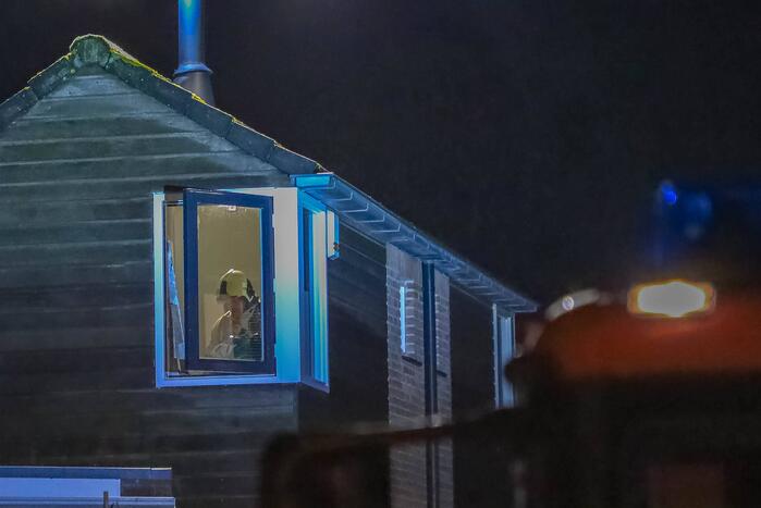 Brandweer blust schoorsteenbrand