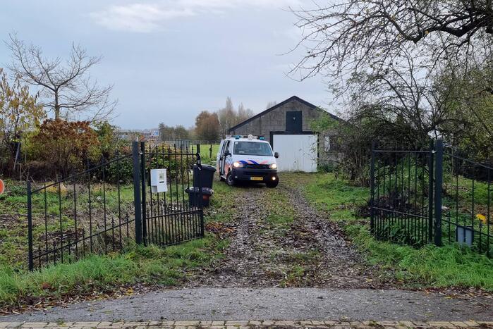 Politieonderzoek bij dicht getimmerde woning
