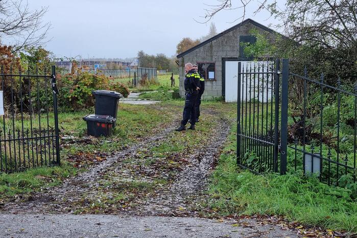Politieonderzoek bij dicht getimmerde woning