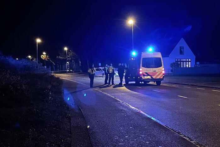 Auto klemgereden na achtervolging