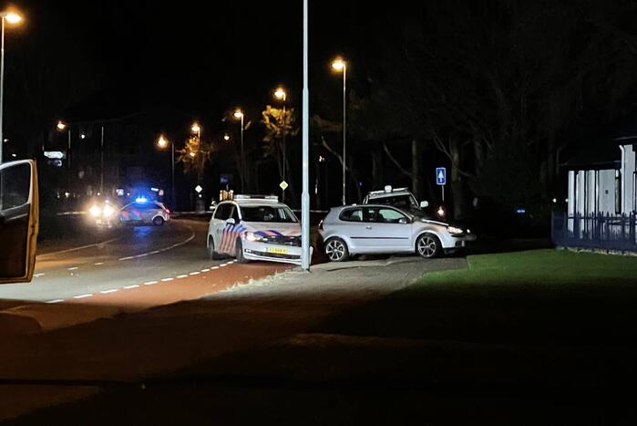 Auto klemgereden na achtervolging